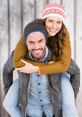 Poster - Man giving piggy back to woman