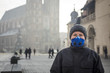 © eunikas - Man using a mask,  protecting himself from smog