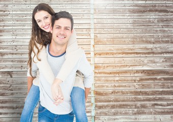 Poster - Man giving piggyback ride to woman