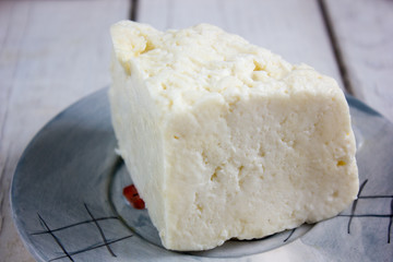 Traditional indian cheese panneer prepared form fresh milk on plate