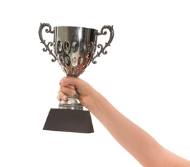 Woman  holding a champion silver trophy on white background