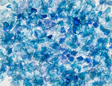 Background Of The Pieces Of Plastic Bottles Blue Colored. Sliced Pieces PET Of Bottles