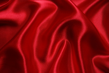 Wall Mural - Red cloth waves background texture.