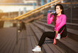 © Milos Vucicevic - Fit woman drink water after her exercise.