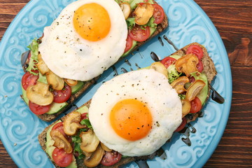 Wall Mural - Sandwich with egg, tomato, greens, and mushrooms