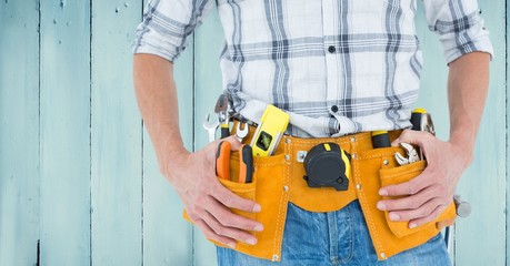 Canvas Print - Handyman with tool belt at home