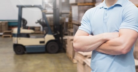 Wall Mural - Manager standing with arms crossed in warehouse