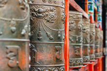Tibetan Prayer Wheels At The Famous Kumbum Monastery In Qinghai Province, China 