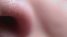 Extreme Closeup Of A White Male Flaring His Nostrils  