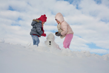 Wall Mural - Two cute grill in the snow.