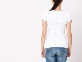 Wall Mural - T-shirt design, people concept - closeup of young woman in blank white t-shirt, shirt, rear isolated. Mockup square.