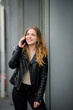 © Martinan - On phone - teen in street