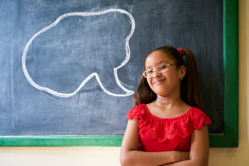 Wall Mural - Portrait Of Happy Girl Student With Cloud On Blackboard