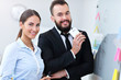 © Kalim - Businesspeople working together in office