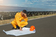 © weerajata - Engineer checking plan of solar panel