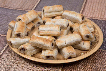 Chocolate cream puff pastry on the baking tray