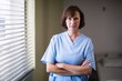 © WavebreakMediaMicro - Portrait of nurse standing with arms crossed