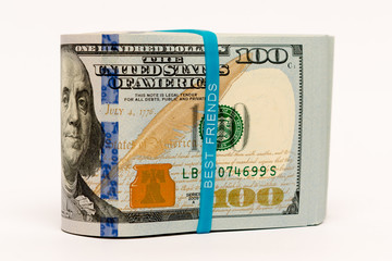 Stack of money in US dollars cash banknotes