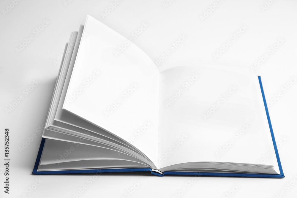 Open book on white background