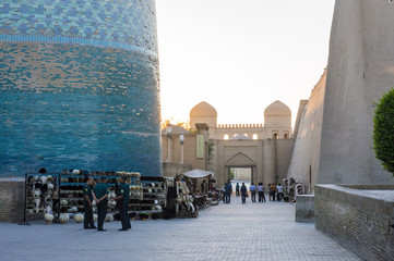 Wall Mural - Kalta Minor Minaret view at the sunset time in Itchan Kala, the walled inner town of the city of Khiva, Uzbekistan. UNESCO World Heritage