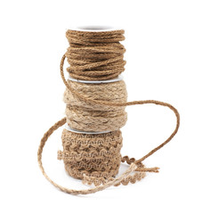 Wall Mural - Pile of rope bobbins isolated