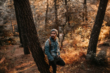 Man Having Peaceful Time In The Forest At Sunset