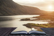 Beautiful sunset landscape image of Wast Water and mountains in