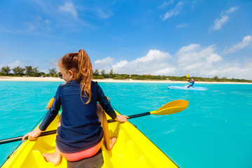 Wall Mural - Family kayaking at tropical ocean