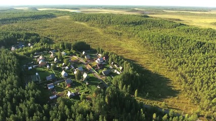 Wall Mural - Aerial view at the village in the marshes and evergreen woods of Karelia, Russia
