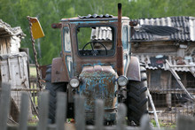 Old Tractor In The Village