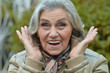 © aletia2011 - Surprise senior woman in autumn