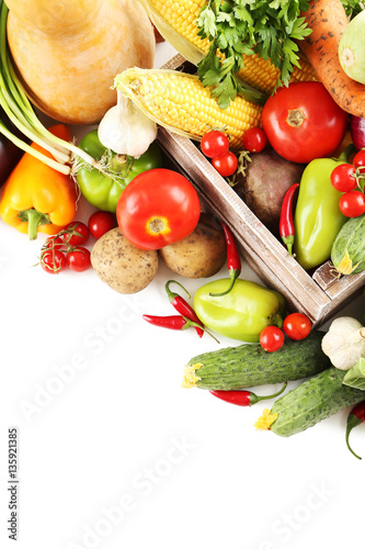 Naklejka - mata magnetyczna na lodówkę Ripe and tasty fruits and vegetables on a white background