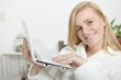 © Philipimage - portrait of a woman using a laptop