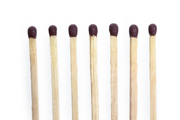 Matches isolated on white background. Closeup shot.