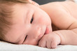 © feelphotoartzm - Close up picture of beautiful newborn baby resting on blanket