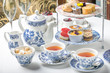 afternoon tae set up hotel sandwich food fancy table stand cake china porcelain five