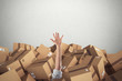 © alphaspirit - Man buried by a stack  of cardboard boxes. 3D Rendering