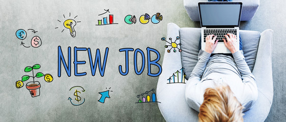 Wall Mural - new job text with man using a laptop
