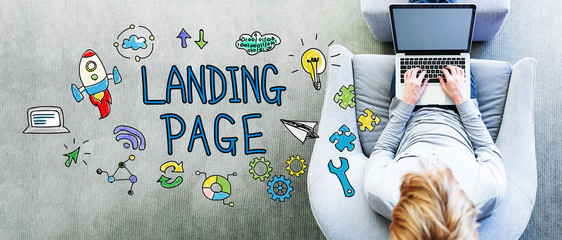 Wall Mural - landing page text with man using a laptop