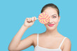 © tugolukof - fun girl with candy on blue background