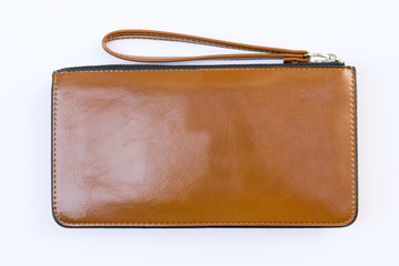 Wall Mural - Closeup brown leather purse on white background