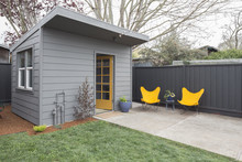 Guest House Or Shed With Yellow Camping Chairs