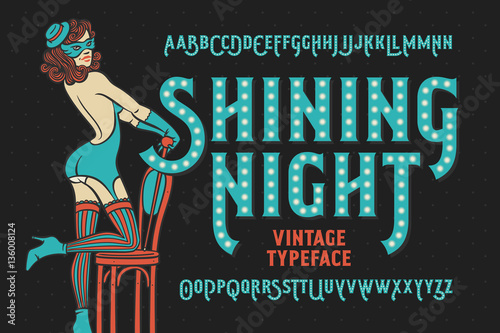 Fotografie, Obraz Vintage cabaret style font with beautiful female dancer wearing stocking, gloves, mask and lingerie