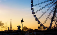 The Ferris Wheel And The Eiffel Tower In Paris