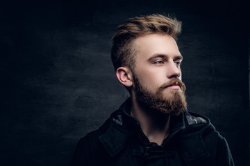 Portrait of bearded stylish young male.