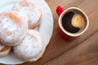 doughnuts with coffee in red cup