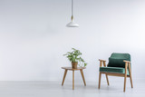 Fototapeta Przestrzenne - White room with green armchair