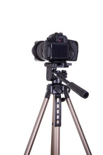 Modern Dslr Camera With Blank Screen On Tripod Isolated On White