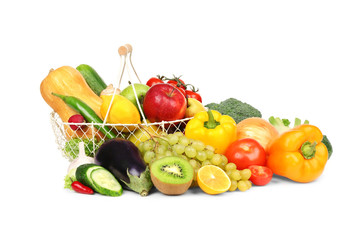 Fototapete - Fresh vegetables and fruits in basket on white background
