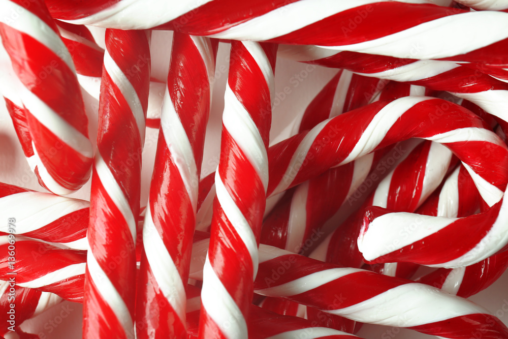 Red and white candy canes for Christmas, closeup